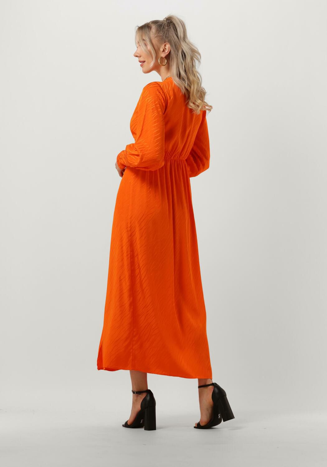 Lange 2025 oranje jurk