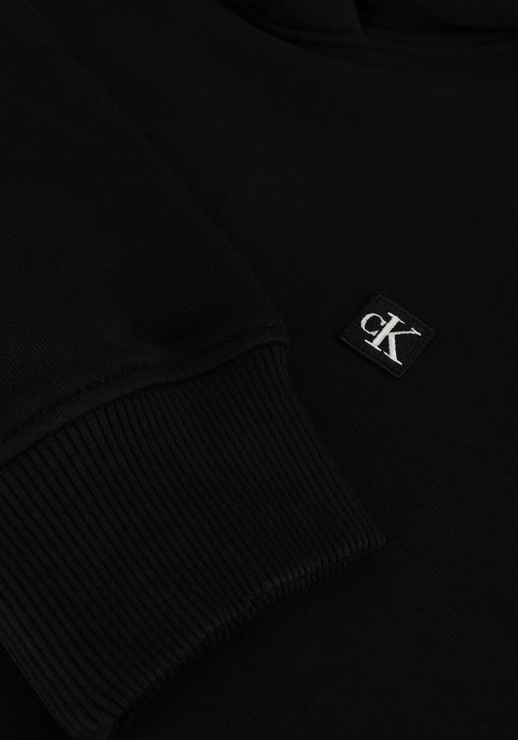 CALVIN KLEIN Pull CK EMBRO BADGE REGULAR HOODIE en noir - large