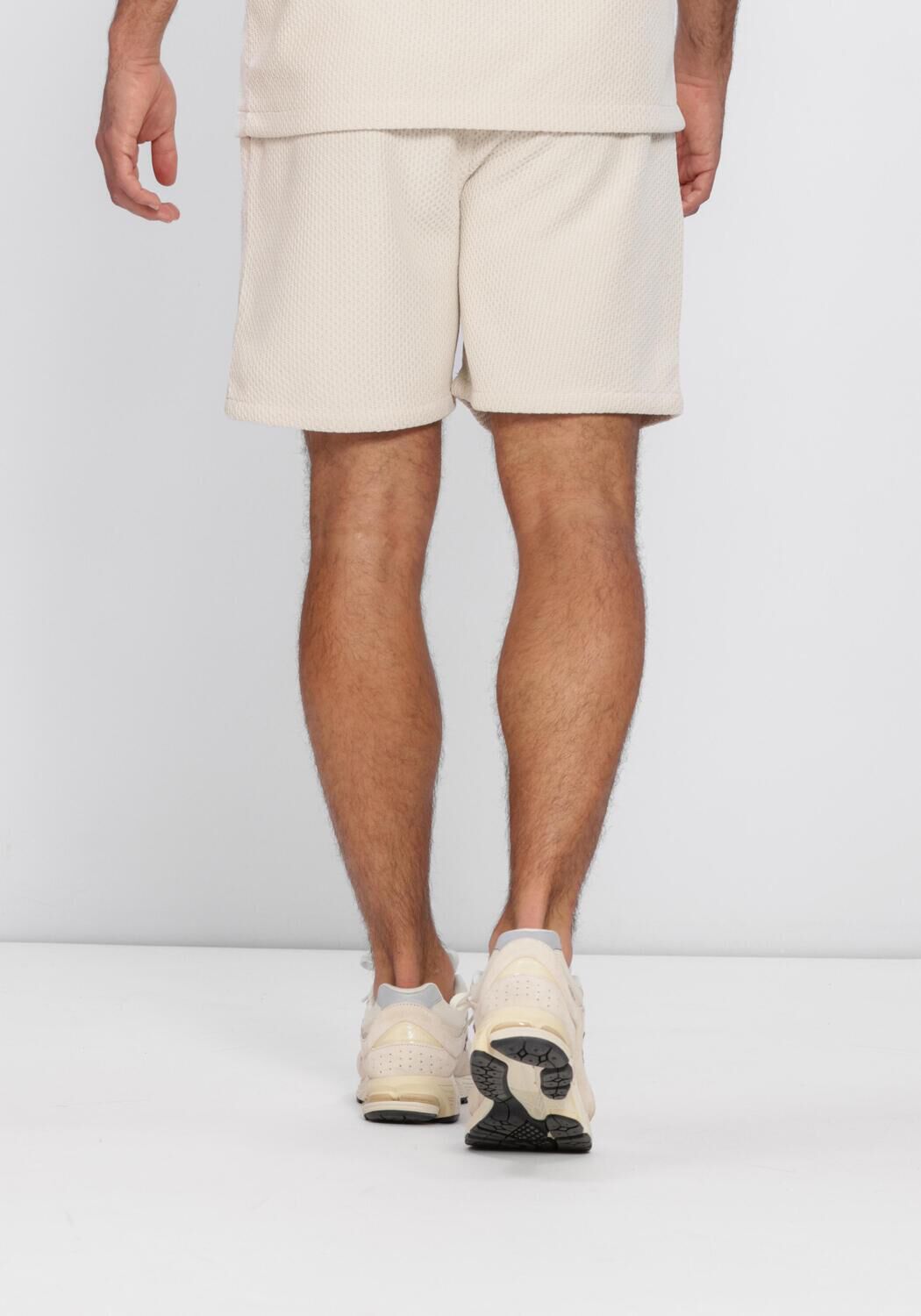 PURE PATH Pantalon courte HONEYCOMB SHORTS en beige - large