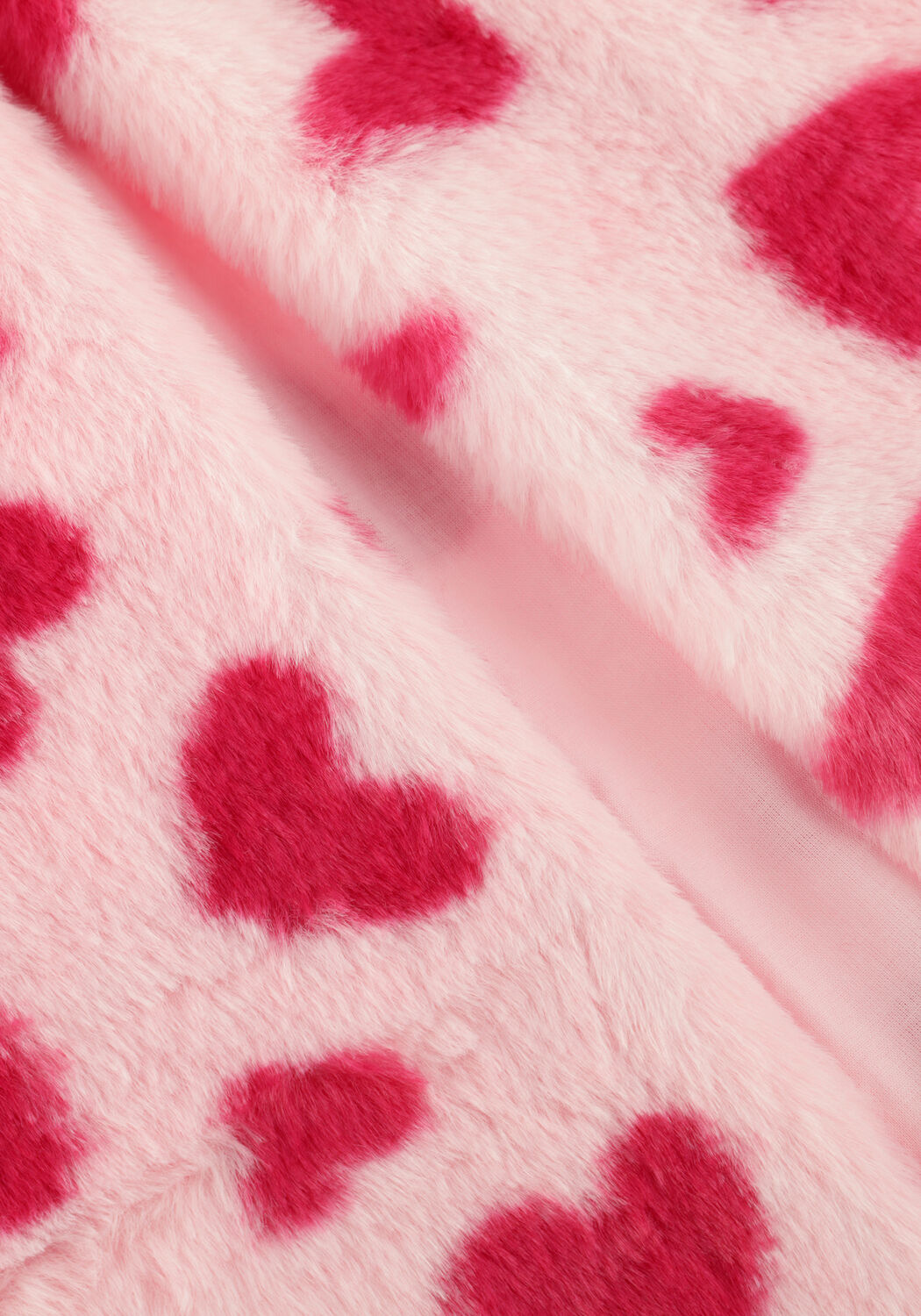 DAILY BRAT Gilet HEART CRUSH TEDDY VEST en rose - large