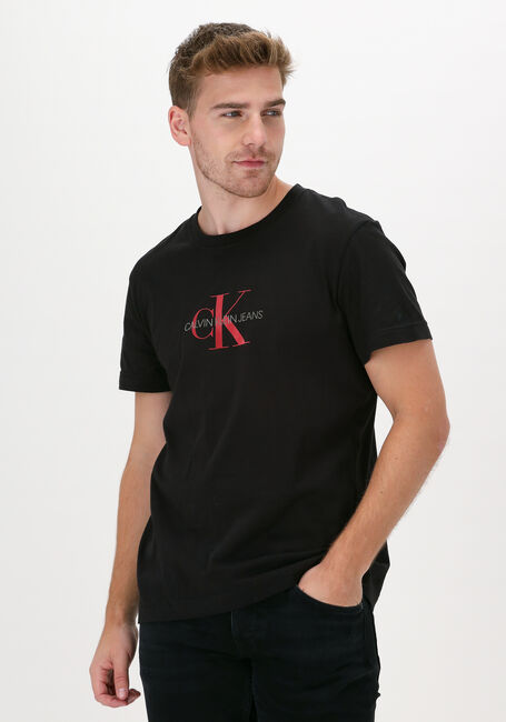 CALVIN KLEIN T-shirt ARCHIVAL MONOGRAM FLOCK TEE en noir - large