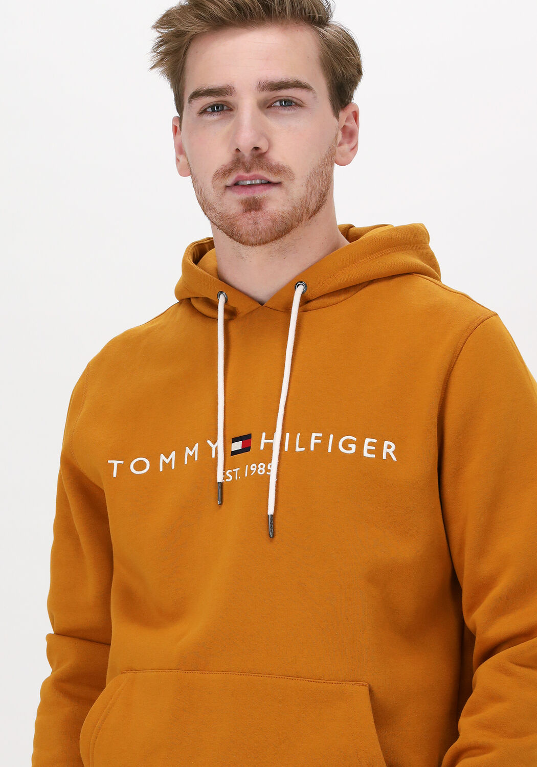 Pull store tommy jaune