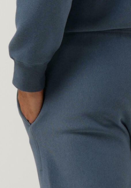 CHAMPION Pantalon de jogging ELASTIC CUFF PANTS en bleu - large