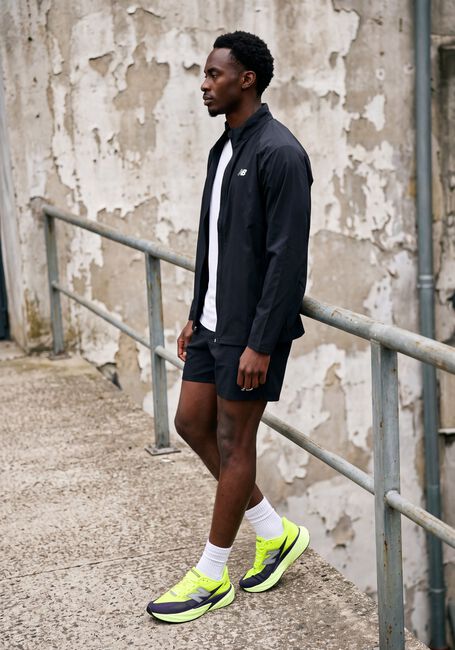 NEW BALANCE Pantalon courte SE SH 5 IN en noir - large