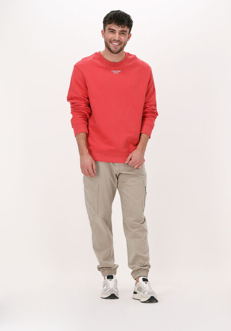 CALVIN KLEIN Chandail STACKED LOGO CREW NECK en orange - large
