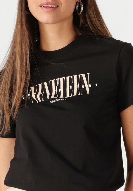 CALVIN KLEIN T-shirt 19 GRAPHIC REG TEE en noir - large