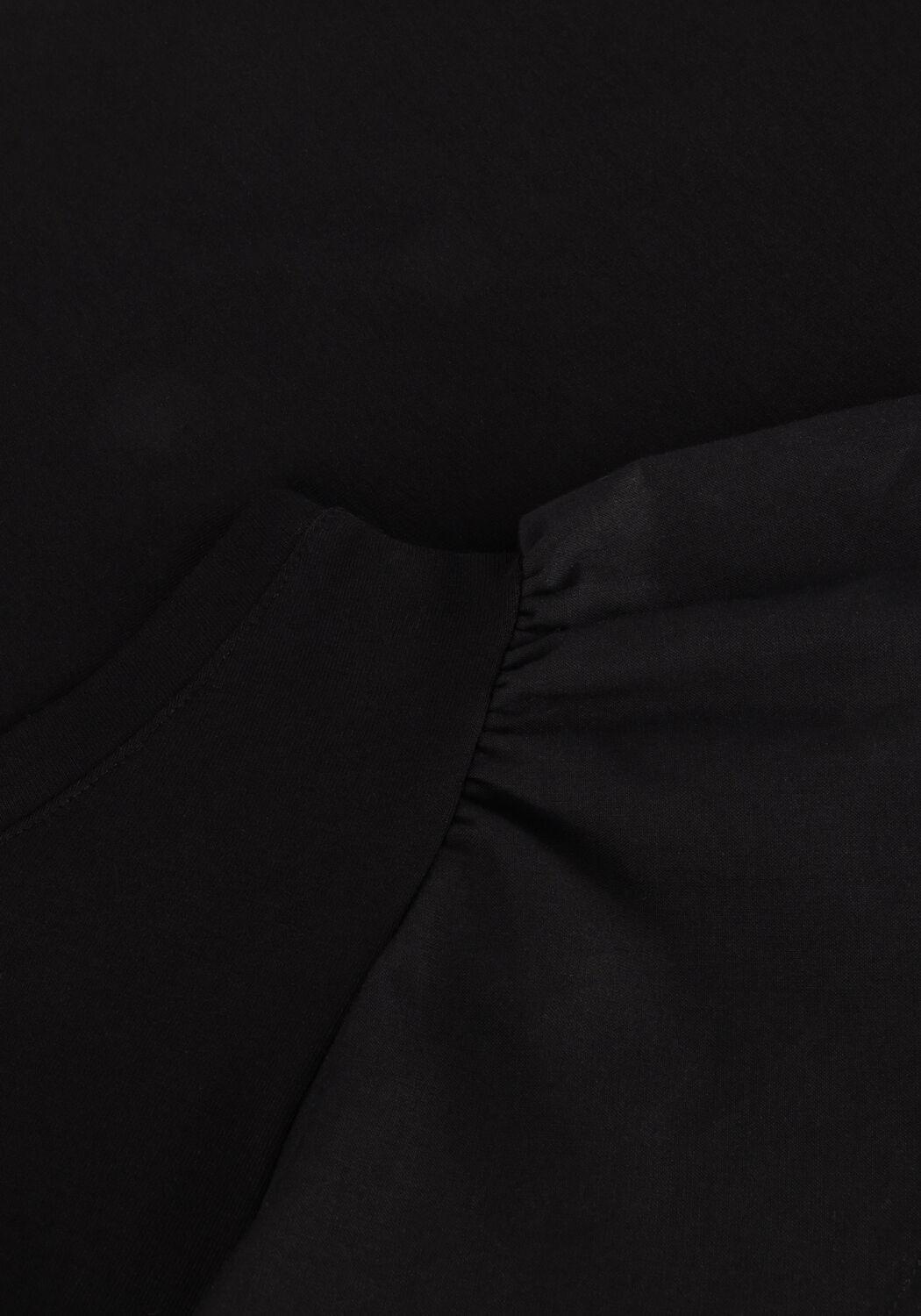 JANSEN AMSTERDAM Haut V367 JERSEY SOLID ONE SHOULDER SINGLET WITH RUFFLE en noir - large