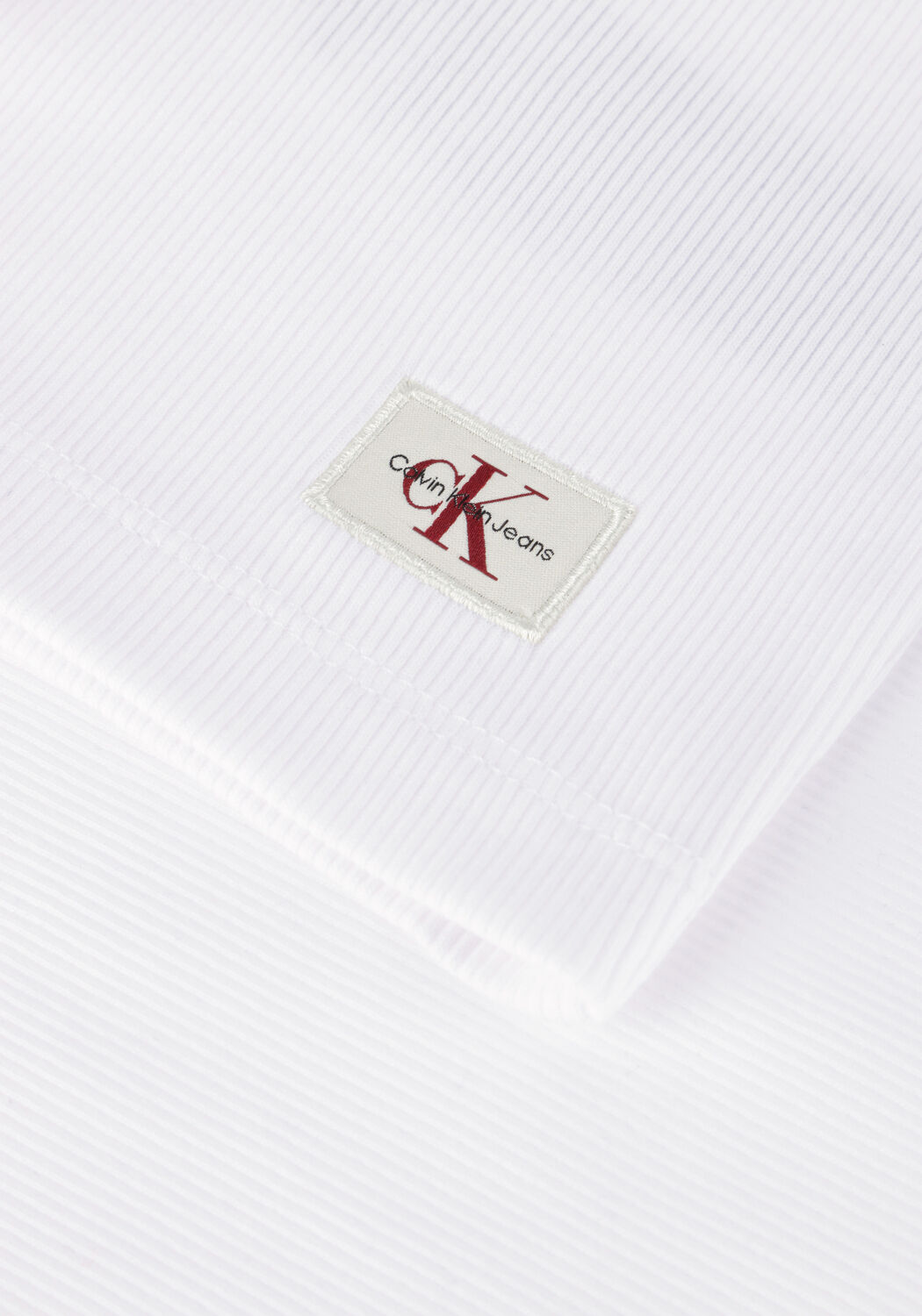 CALVIN KLEIN Haut WOVEN LABEL RIB SLEEVELESS TOP en blanc - large