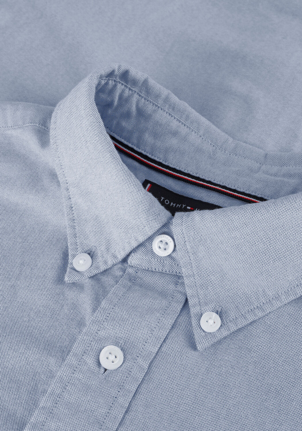 TOMMY HILFIGER Chemise d&eacute;contract&eacute; SOLID HERITAGE OXFORD RF SHIRT en bleu - large