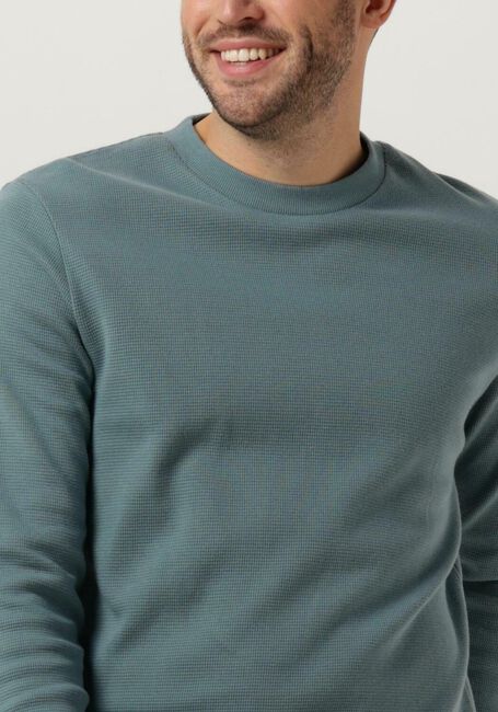 CALVIN KLEIN Pull BADGE WAFFLE LS TEE en bleu - large