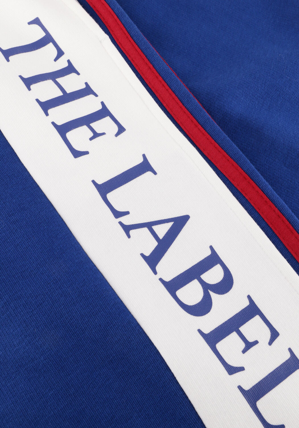 ALIX THE LABEL Pantalon de jogging LADIES KNITTED LOGO TAPE PANTS en bleu - large