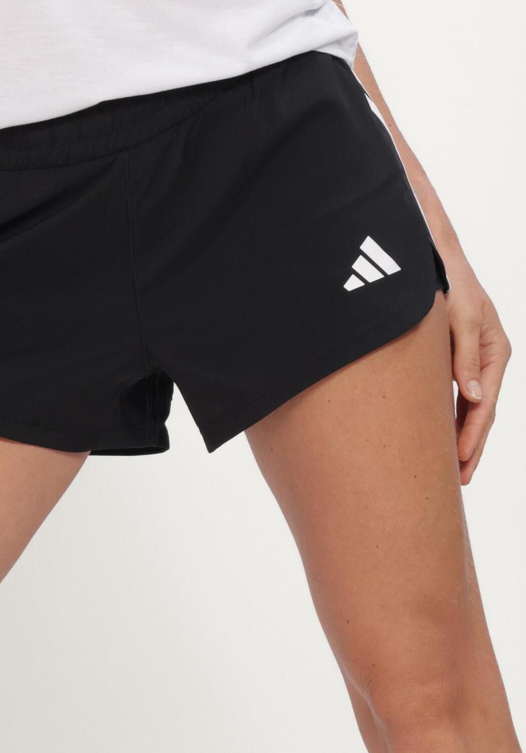 ADIDAS Pantalon courte PACER 2IN1 en noir - large
