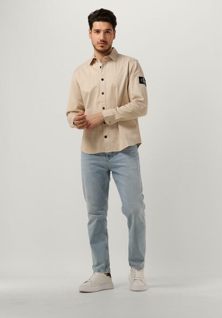 CALVIN KLEIN Surchemise MONOLOGO BADGE RELAXED SHIRT en beige - large