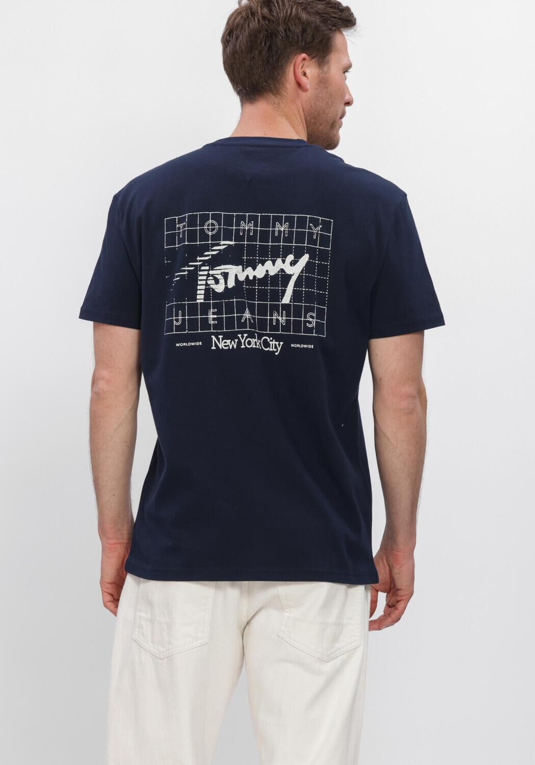 TOMMY JEANS Polo TJM REG SIGN FLAG SS TEE EXT Bleu fonc&eacute; - large