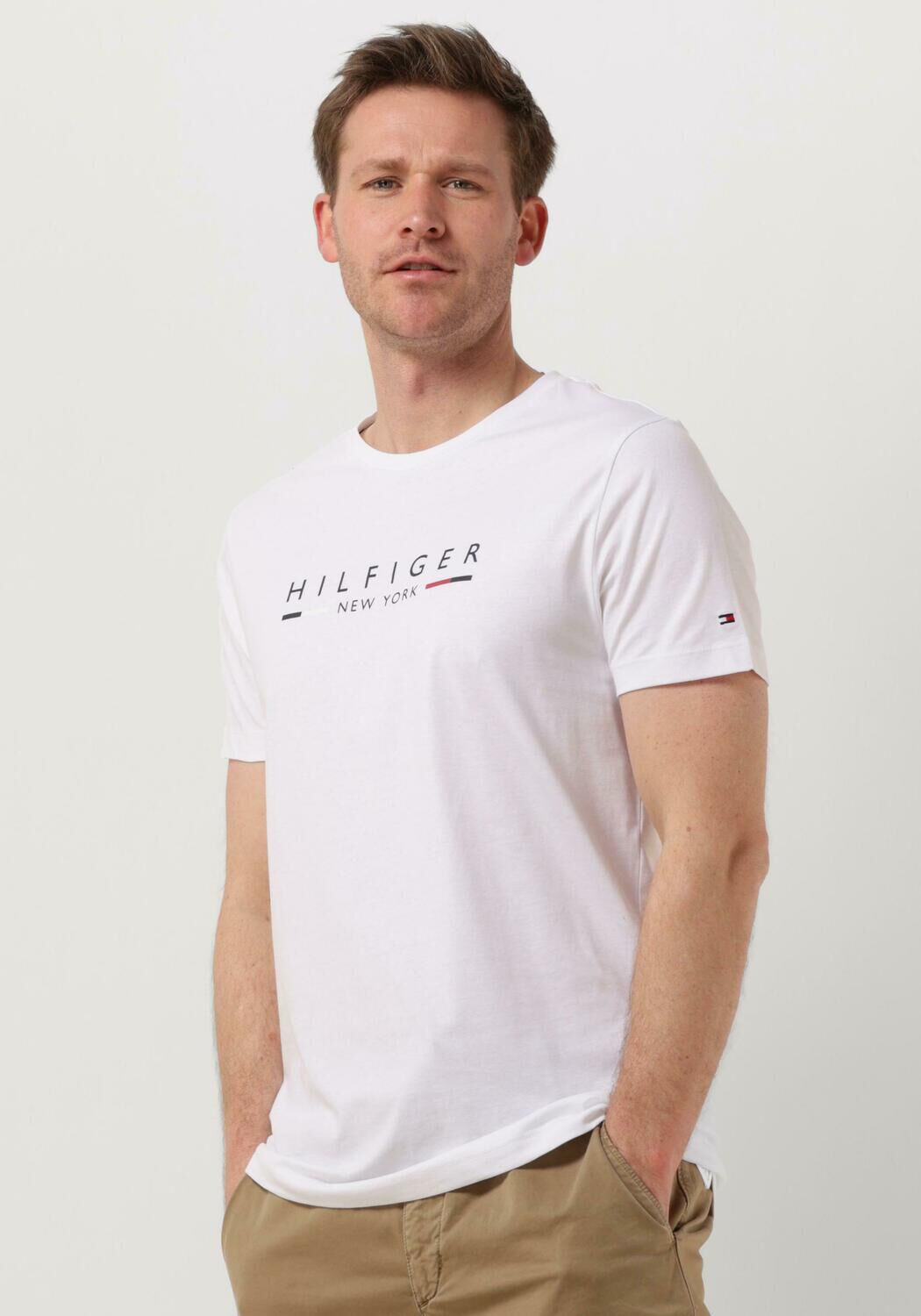Witte TOMMY HILFIGER T shirt HILFIGER NEW YORK TEE Omoda