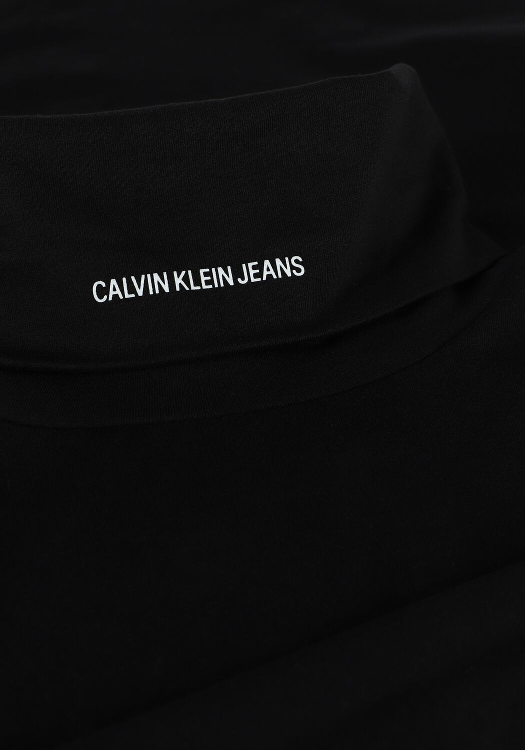 CALVIN KLEIN Haut MICRO BRANDING LS ROLL NECK en noir - large