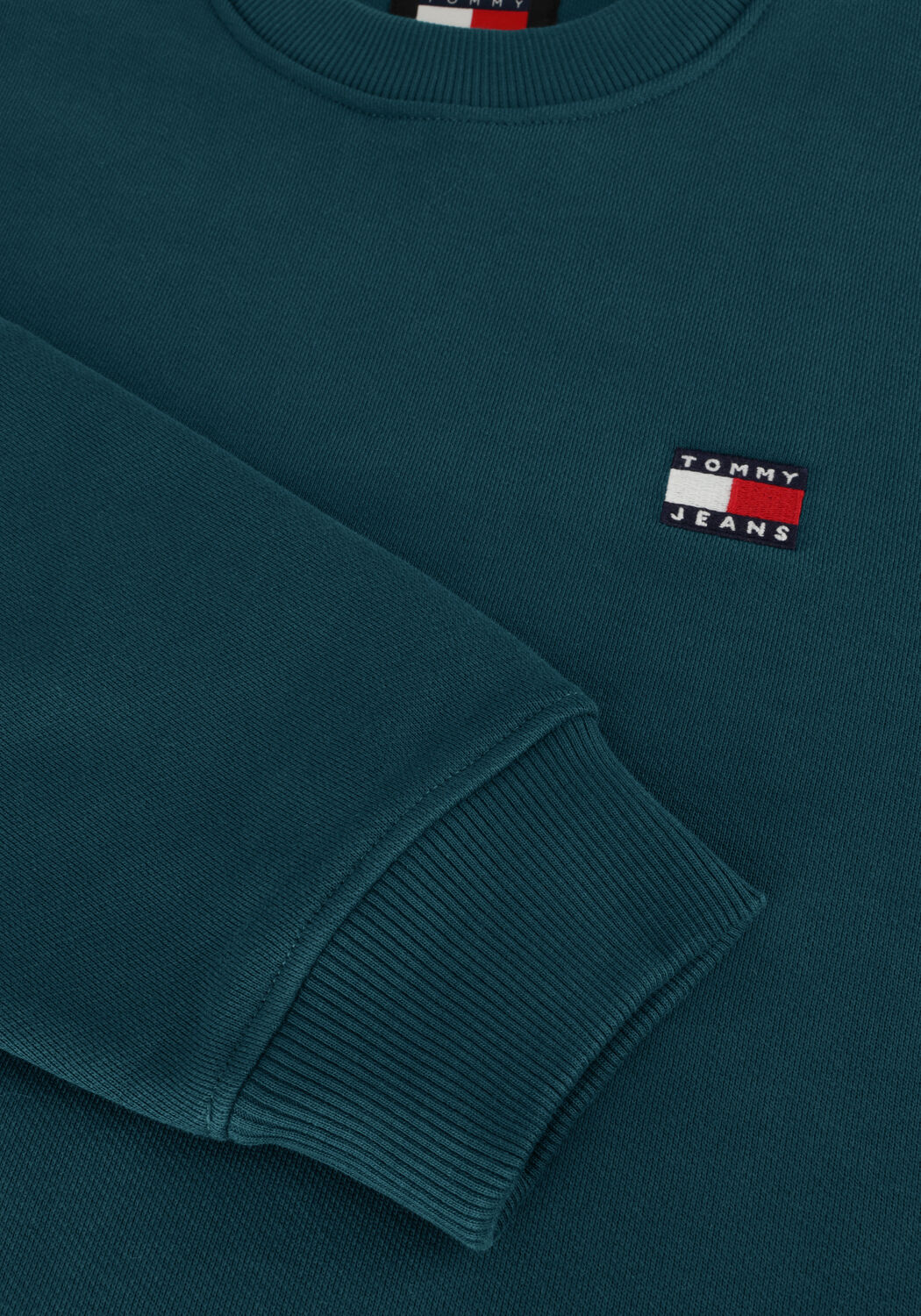 TOMMY JEANS Pull TJM REG BADGE CREW EXT en bleu - large