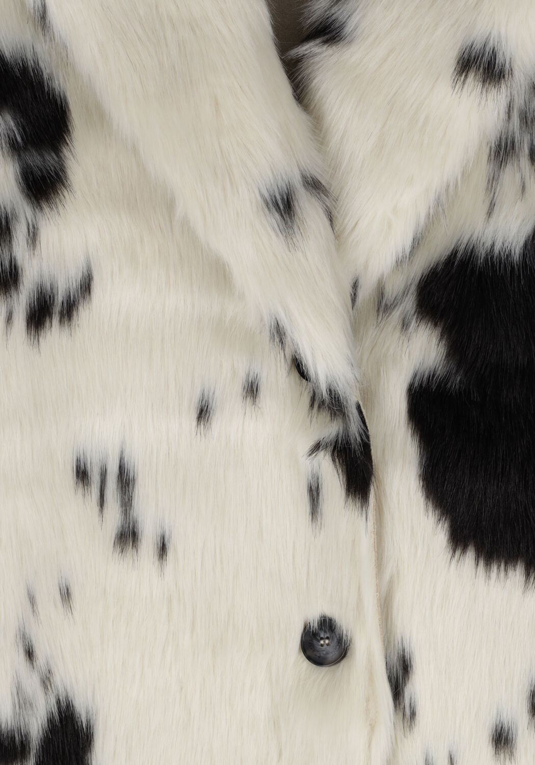 Manteau fausse fourrure sale dalmatien