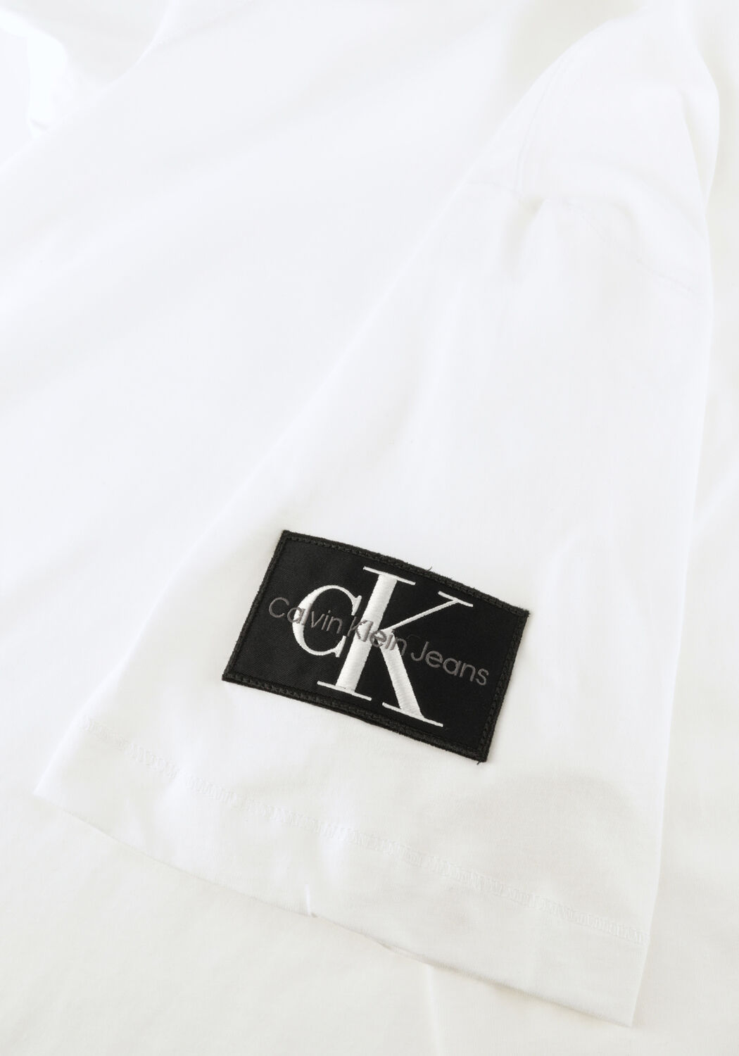 CALVIN KLEIN T-shirt BADGE REGULAR TEE en blanc - large