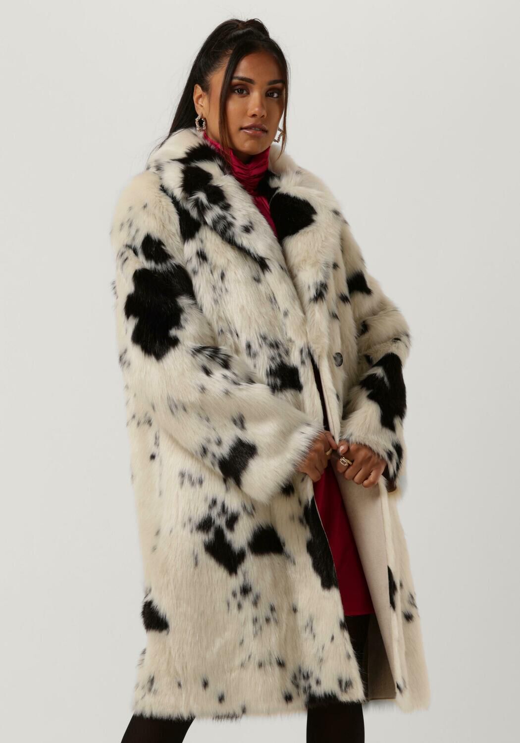 Manteau best sale fourrure reversible