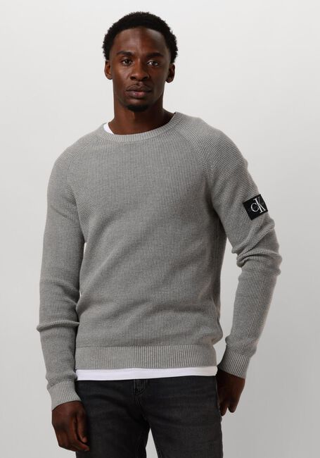 CALVIN KLEIN Chandail BADGE EASY SWEATER en gris - large