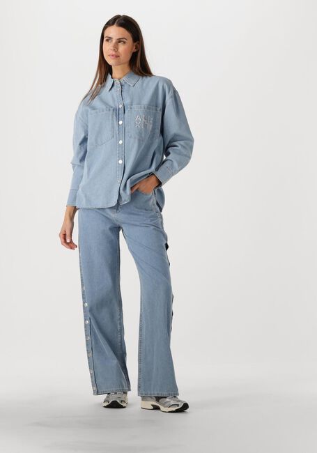 ALIX THE LABEL LADIES WOVEN CHAMBRAY PEPLUM DENIM BLOUSE Blouses en bleu - large