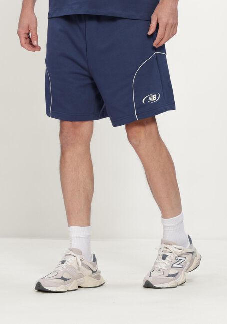 NEW BALANCE Pantalon courte TRACKSIDE FRENCH TERRY SHORT 7 Bleu fonc&eacute; - large