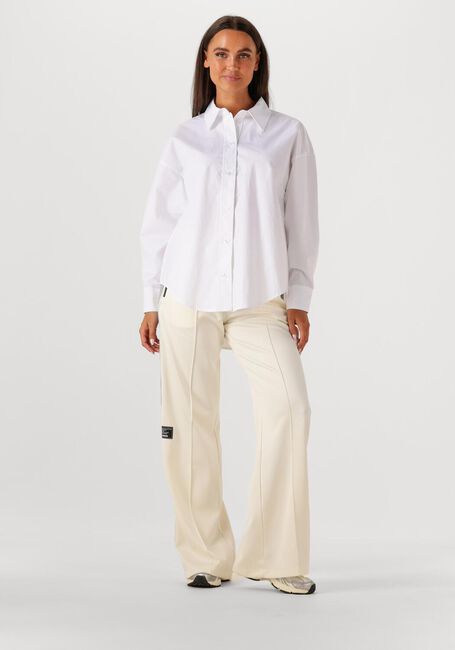 HAUTE L'AMITIÉ TWIST BOW SHIRT Blouses en blanc - large