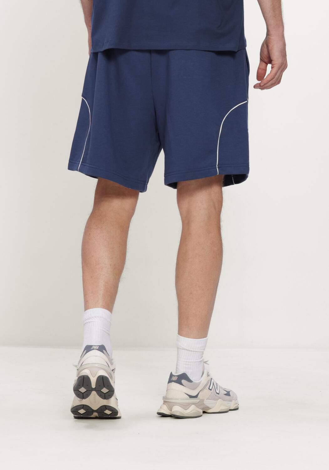 Donkerblauwe NEW BALANCE Korte broek TRACKSIDE FRENCH TERRY SHORT 7 - large