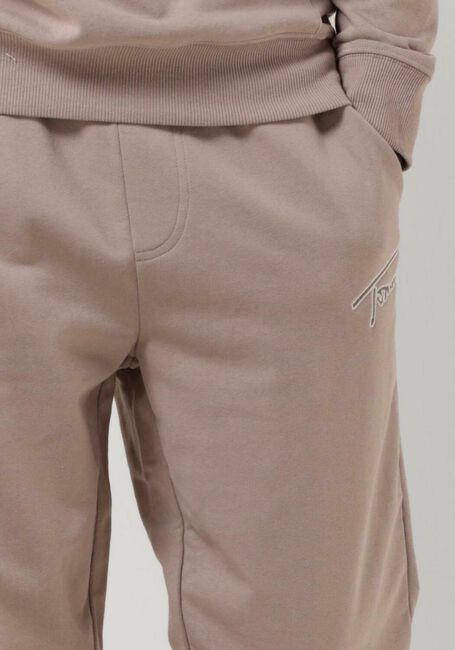 TOMMY JEANS Pantalon de jogging TJM REG SIGNATURE SWEATPANTS en beige - large