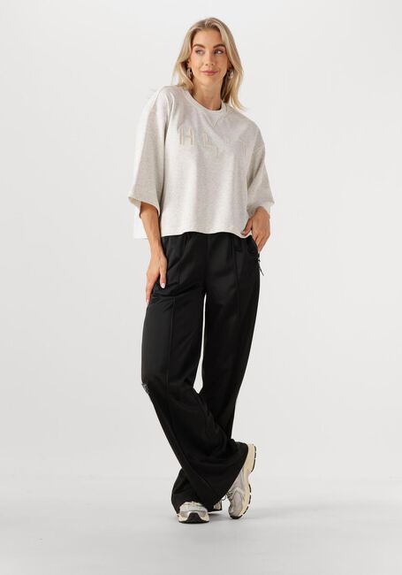 HAUTE L'AMITIÉ Pantalon de jogging BAGGY TRACK TALL PANTS en noir - large