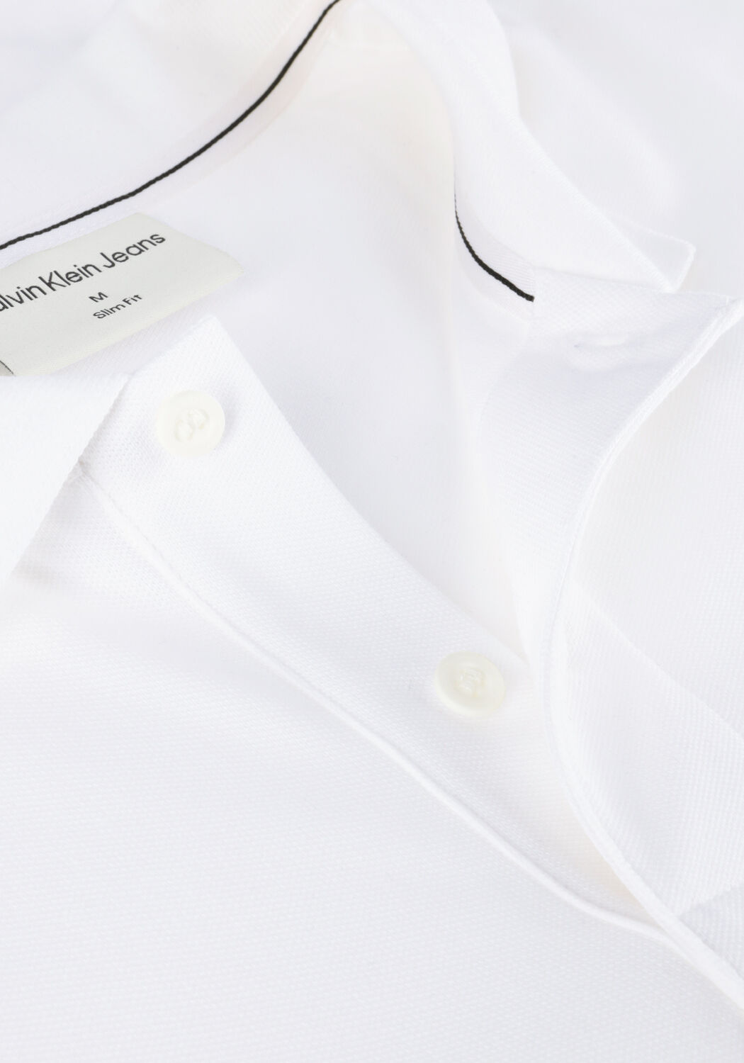 CALVIN KLEIN Polo CK EMBRO BADGE SLIM POLO en blanc - large