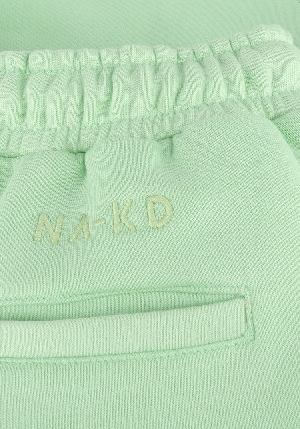 Groene NA-KD Broeken/jumpsuits ORGANIC LOGO SWEATSHORTS - large