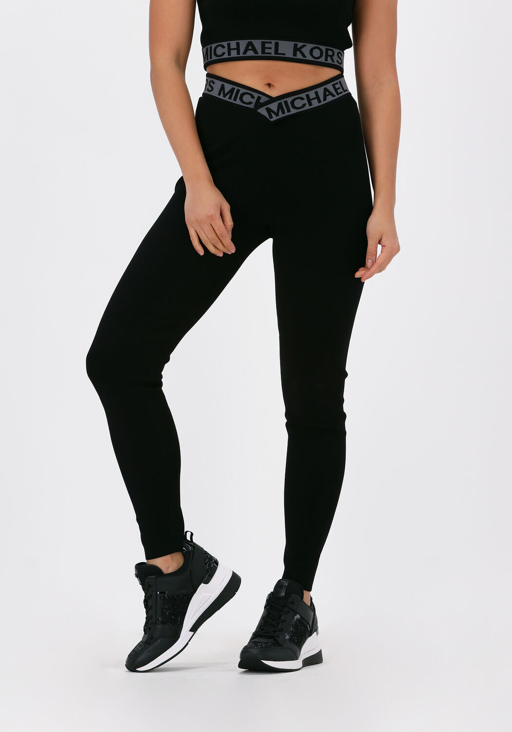 MICHAEL KORS Legging ECO MK TAPE LEGGING en noir Omoda