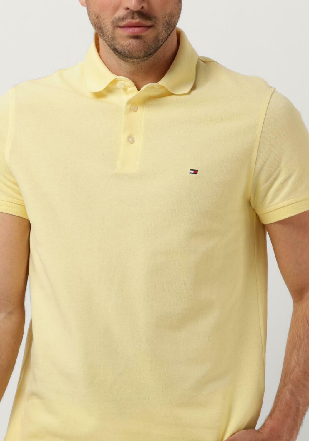 Polo tommy jaune best sale