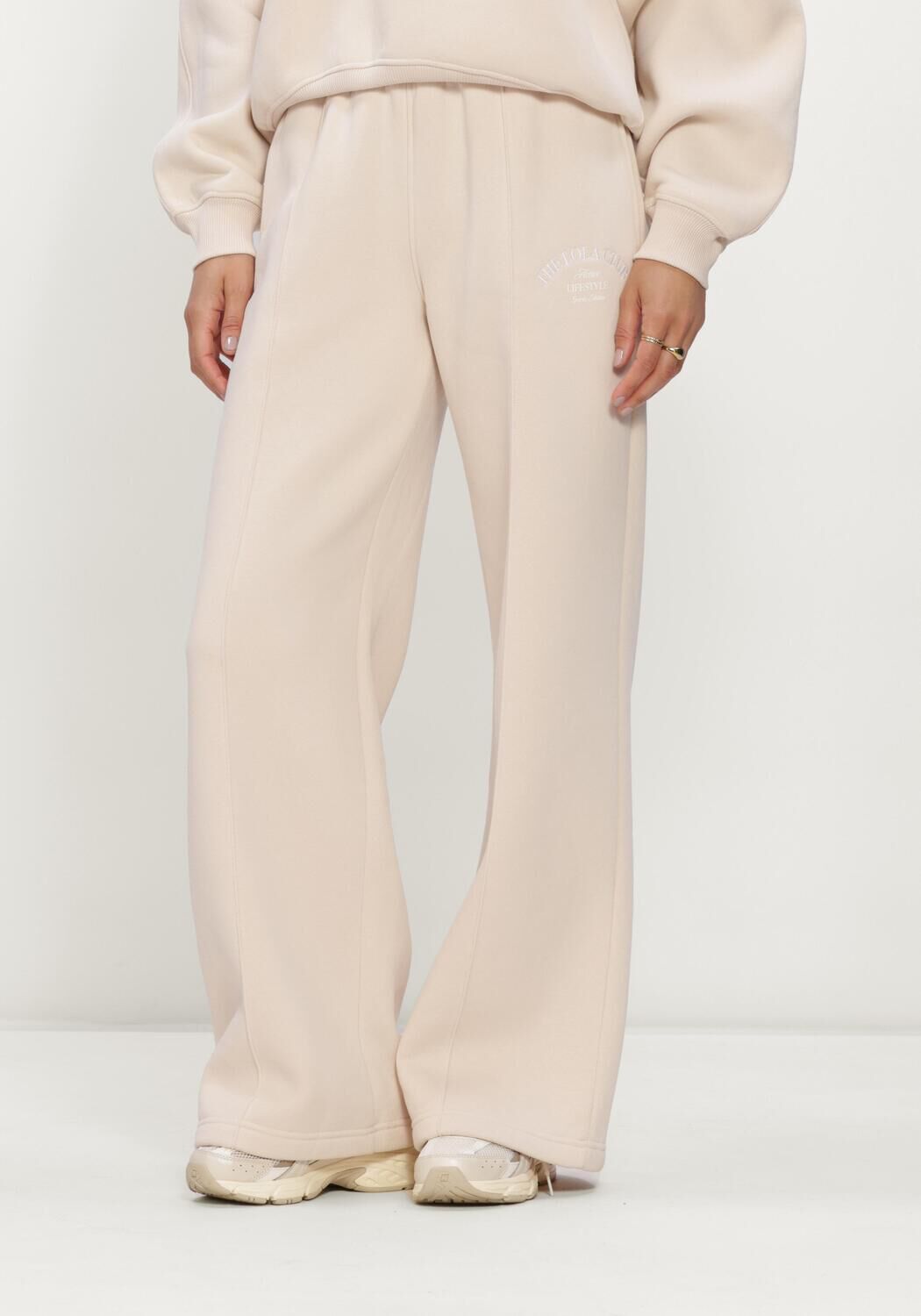 Beige THE LOLA CLUB Flared broek EBONY PANTS - large