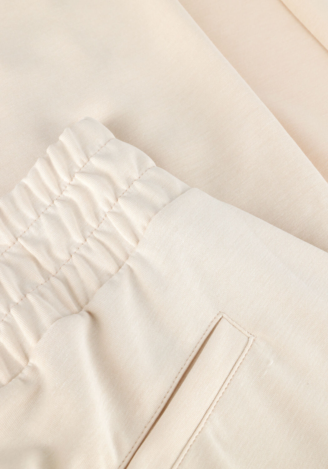 AIMEE THE LABEL Pantalon LOVE2 en beige - large