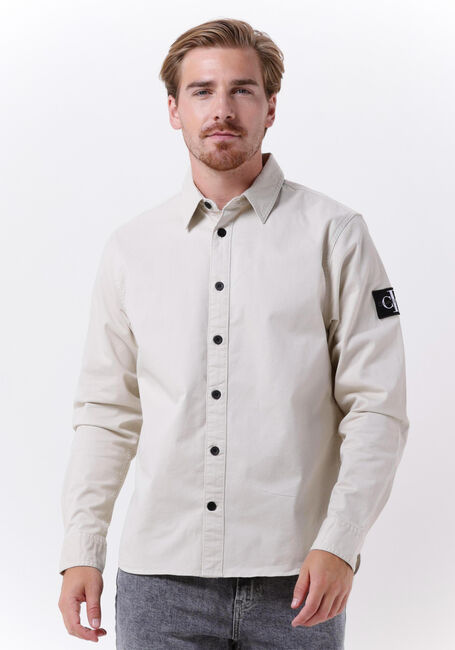 CALVIN KLEIN Surchemise MONOLOGO BADGE RELAXED SHIRT en beige - large