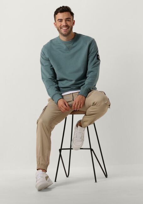 CALVIN KLEIN Chandail BADGE CREW NECK en bleu - large