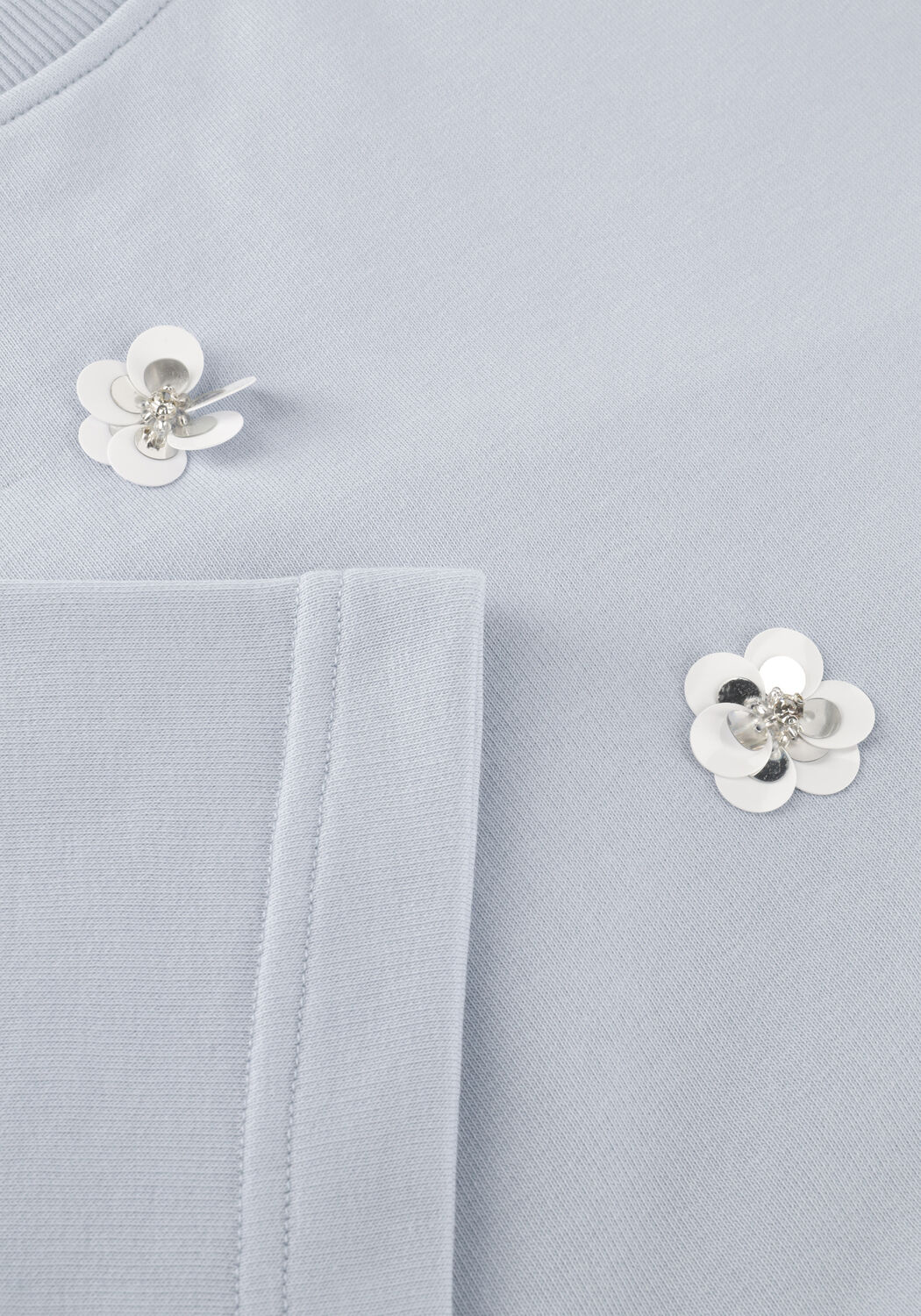 Blauwe JANSEN AMSTERDAM Truien/vesten NOA TRUI SW 170 SWEAT SHORT SLEEVE FLOWER SEQUINS - large