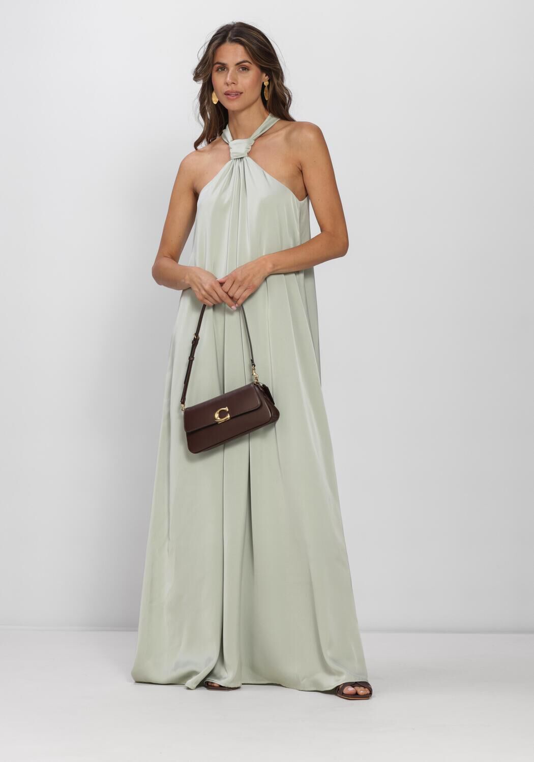 COACH JET SHOULDER Sac bandouli&egrave;re en marron - large