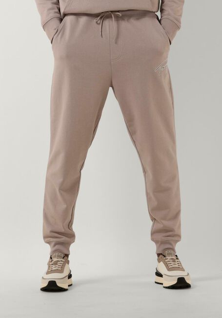 TOMMY JEANS Pantalon de jogging TJM REG SIGNATURE SWEATPANTS en beige - large