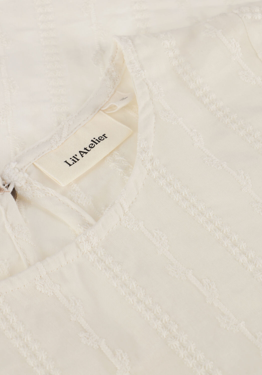 Witte LIL' ATELIER  NMFJAZELLE SS LOOSE SHIRT LIL - large