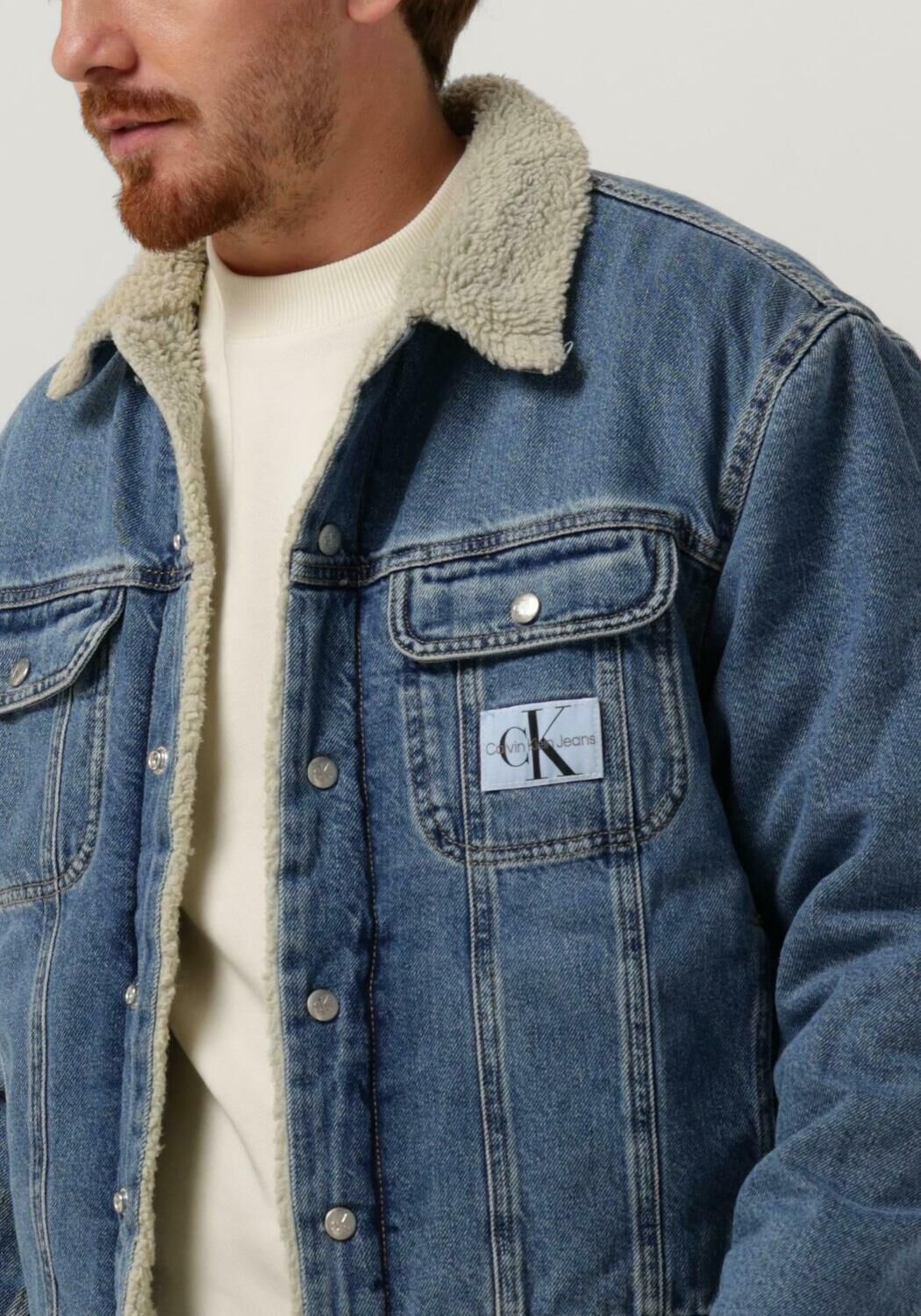 CALVIN KLEIN Veste en jean REGULAR 90S SHERPA DENIM JACKET en bleu