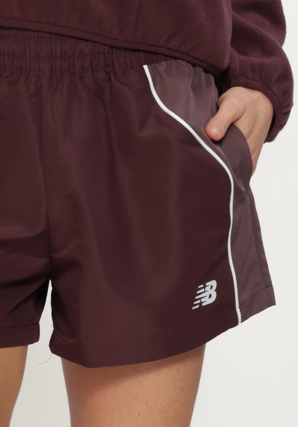 NEW BALANCE Shorts de sport TRACKSIDE WOVEN SHORT Bordeaux - large
