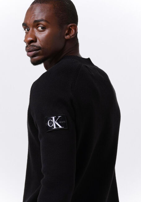 CALVIN KLEIN Chandail MONOLOGO BADGE SWEATER en noir - large