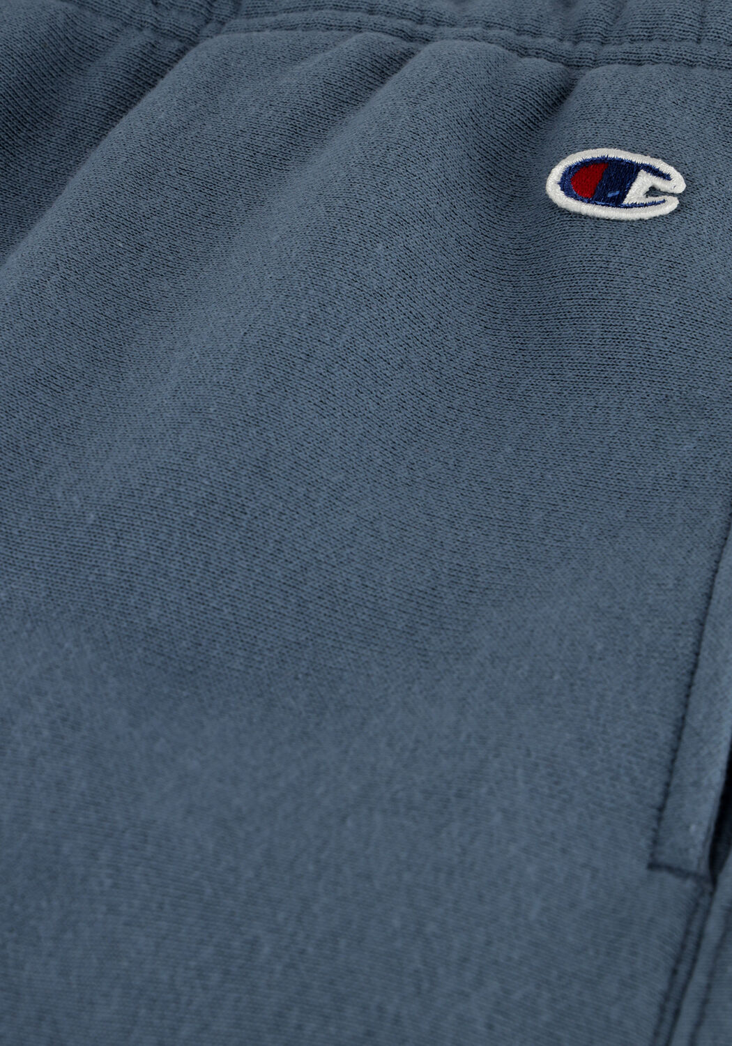 CHAMPION Pantalon de jogging ELASTIC CUFF PANTS en bleu - large