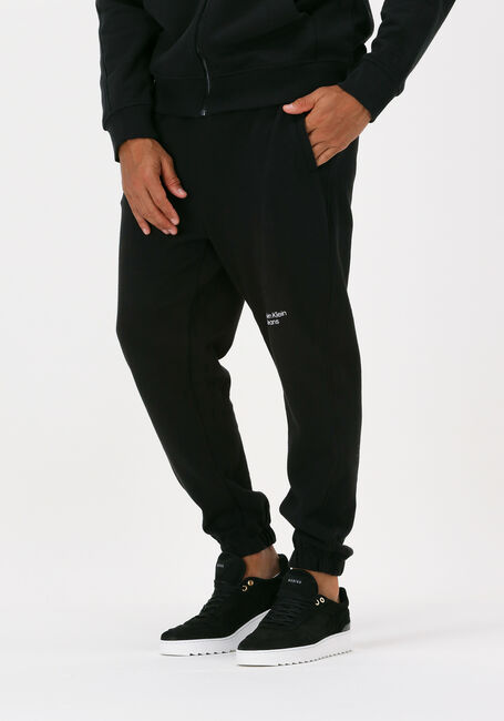 CALVIN KLEIN Pantalon de jogging STACKED LOGO HWK PANT en noir - large