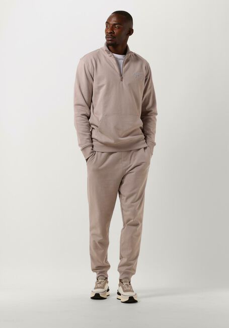 TOMMY JEANS Pantalon de jogging TJM REG SIGNATURE SWEATPANTS en beige - large
