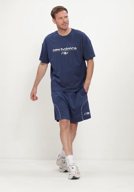 Donkerblauwe NEW BALANCE Korte broek TRACKSIDE FRENCH TERRY SHORT 7 - large